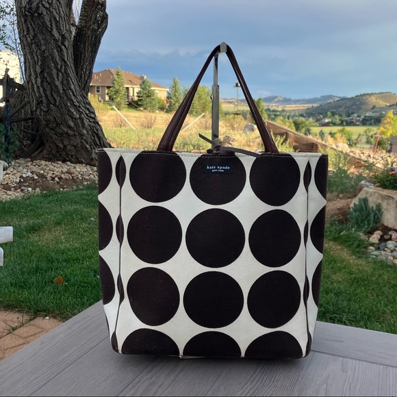 kate spade Handbags - Kate spade canvas tote with leather closure tie and handles